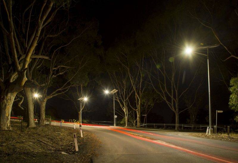 Solar street lights on a council road at night